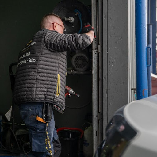 Up and Down Garage Doors - Portes de garage