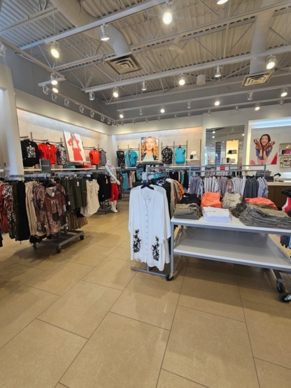 Le Grenier - Magasins de vêtements pour femmes