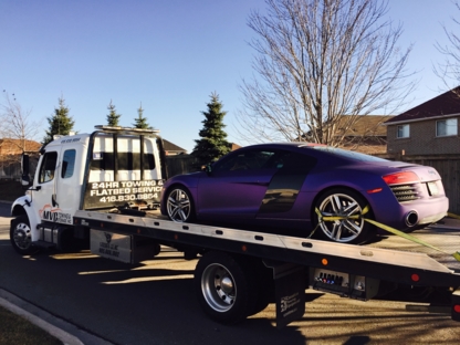 Towing and Flatbed Service - Vehicle Towing