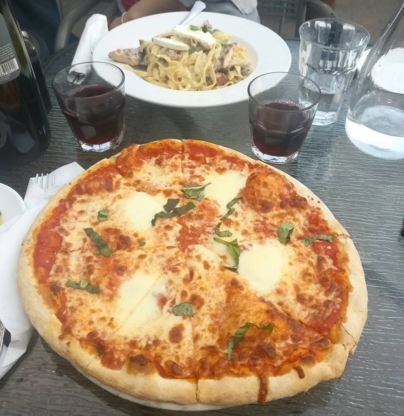Pizza Pizzerias In Little Italy Montreal Qc Yellowpagesca