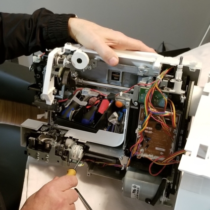Sewing Machine Repair Service - Réparation d'appareils électroménagers