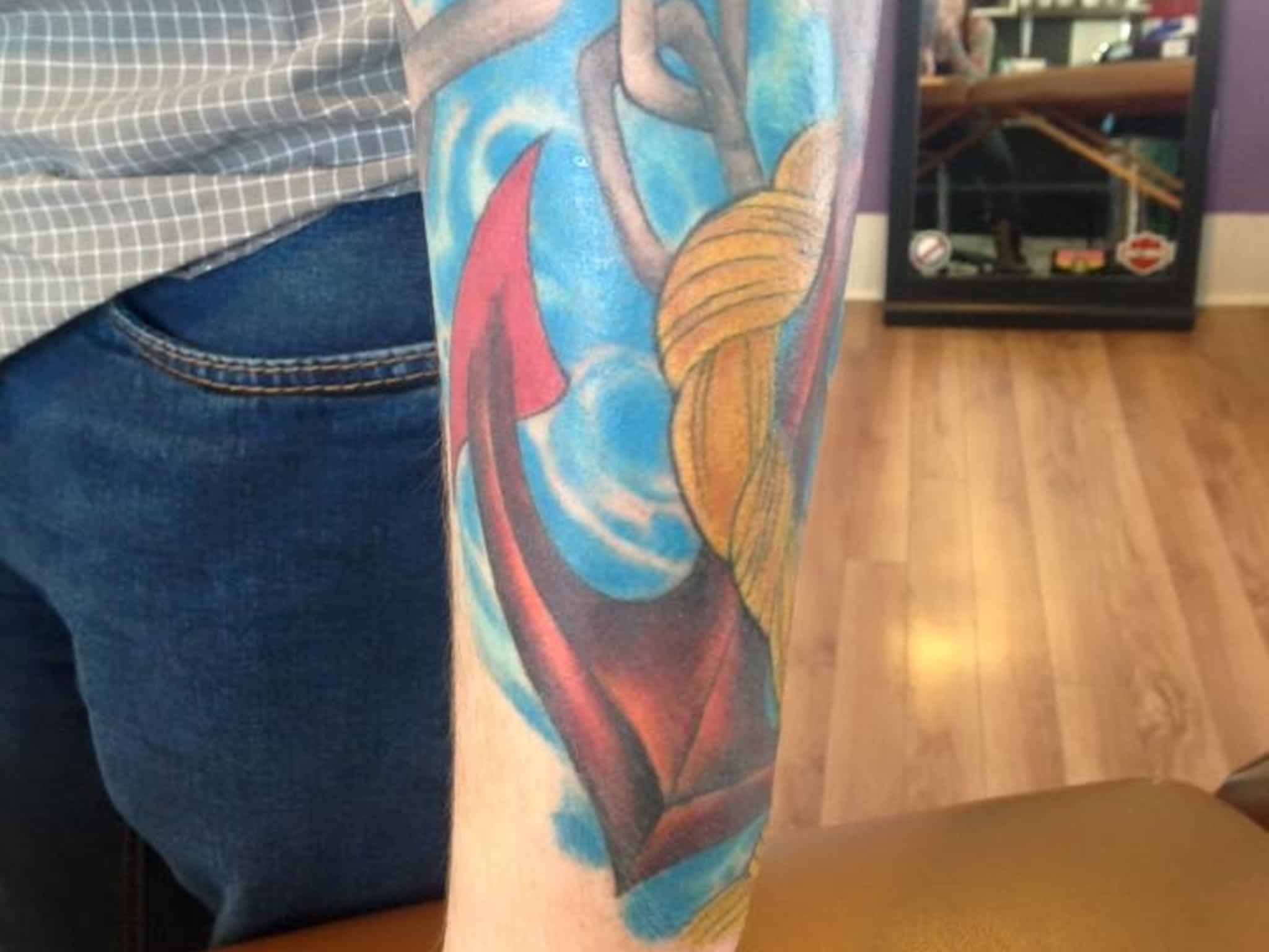photo Infiniti Tattoos & Piercing Studios