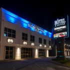 Hotel Et Suites Le Dauphin - Motels