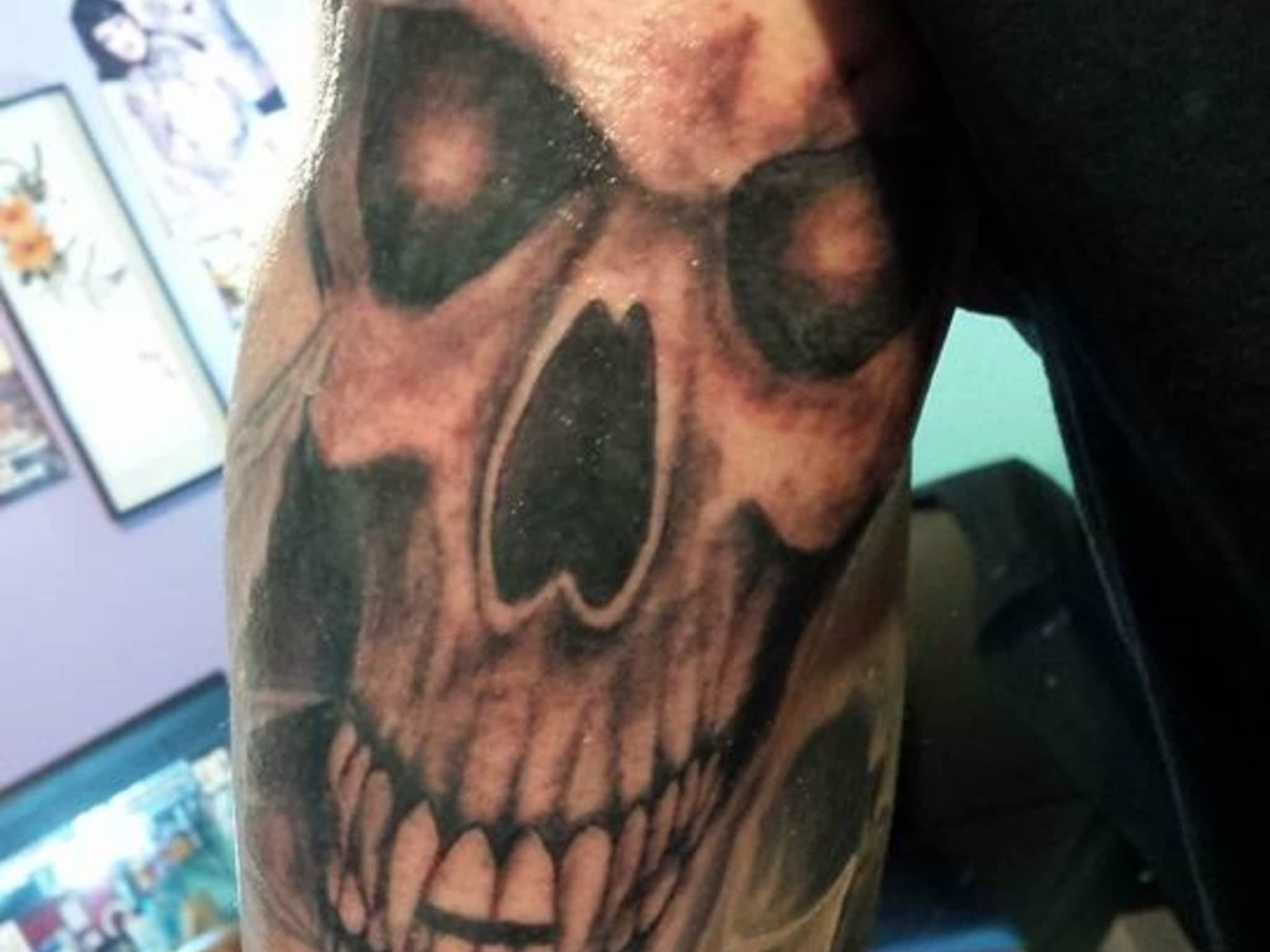 photo Infiniti Tattoos & Piercing Studios