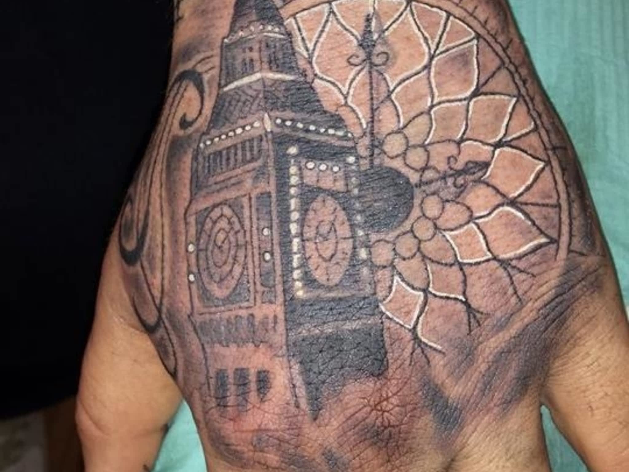 photo Infiniti Tattoos & Piercing Studios
