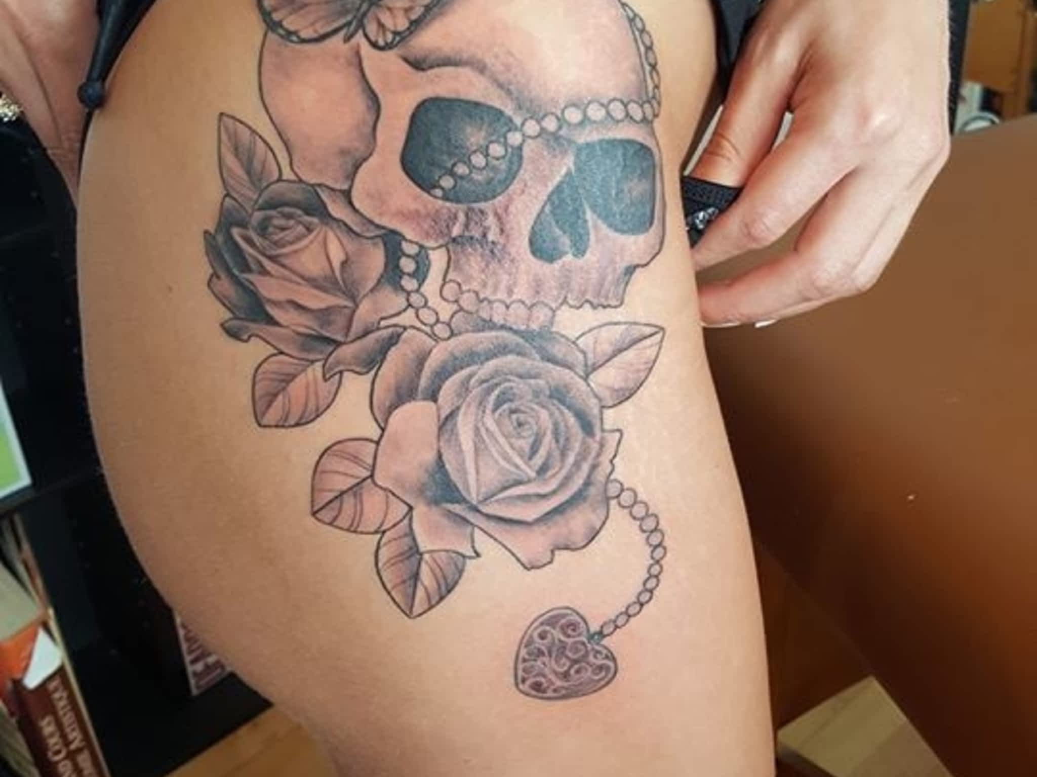 photo Infiniti Tattoos & Piercing Studios