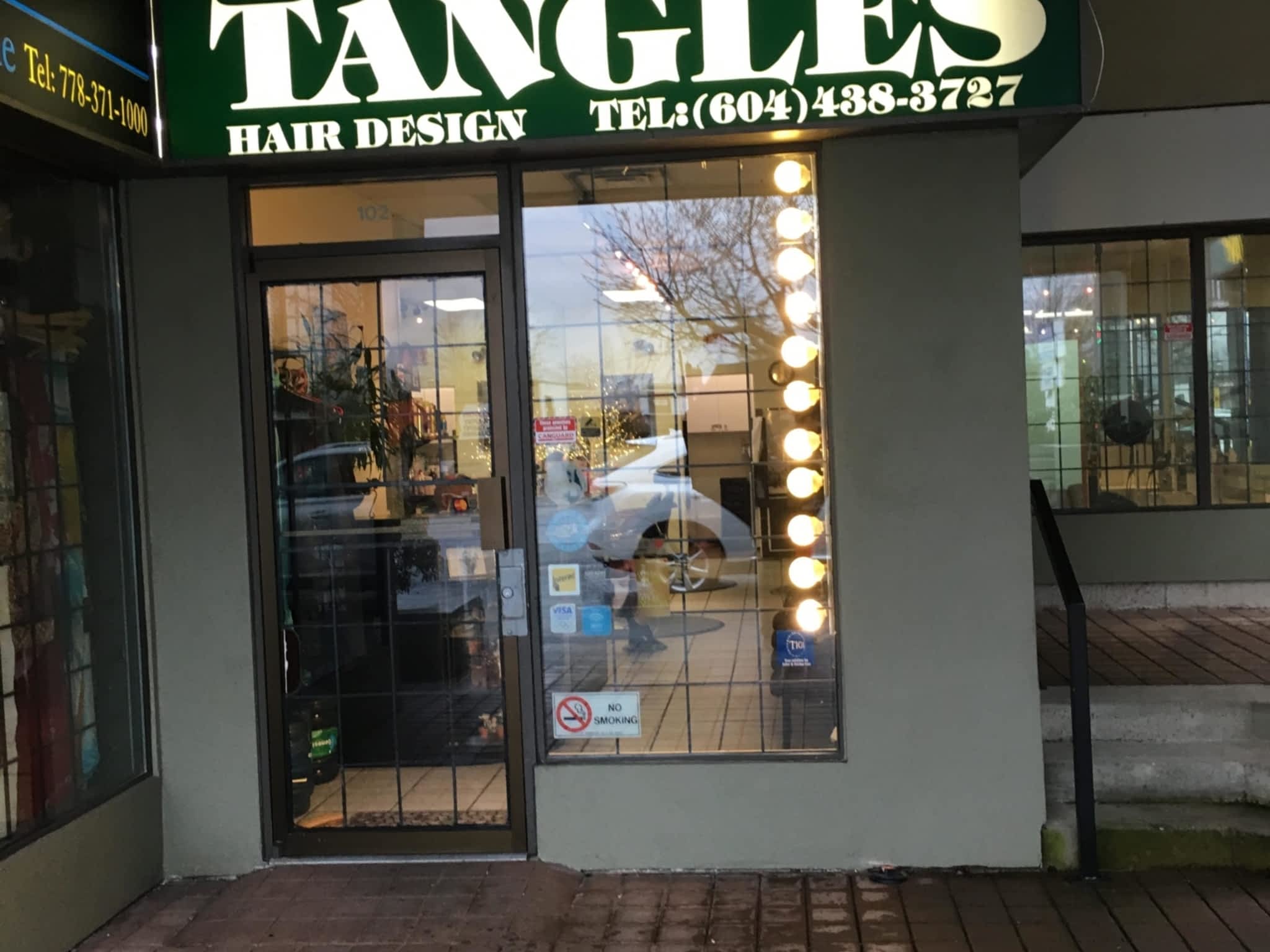 photo Tangles Hair Design