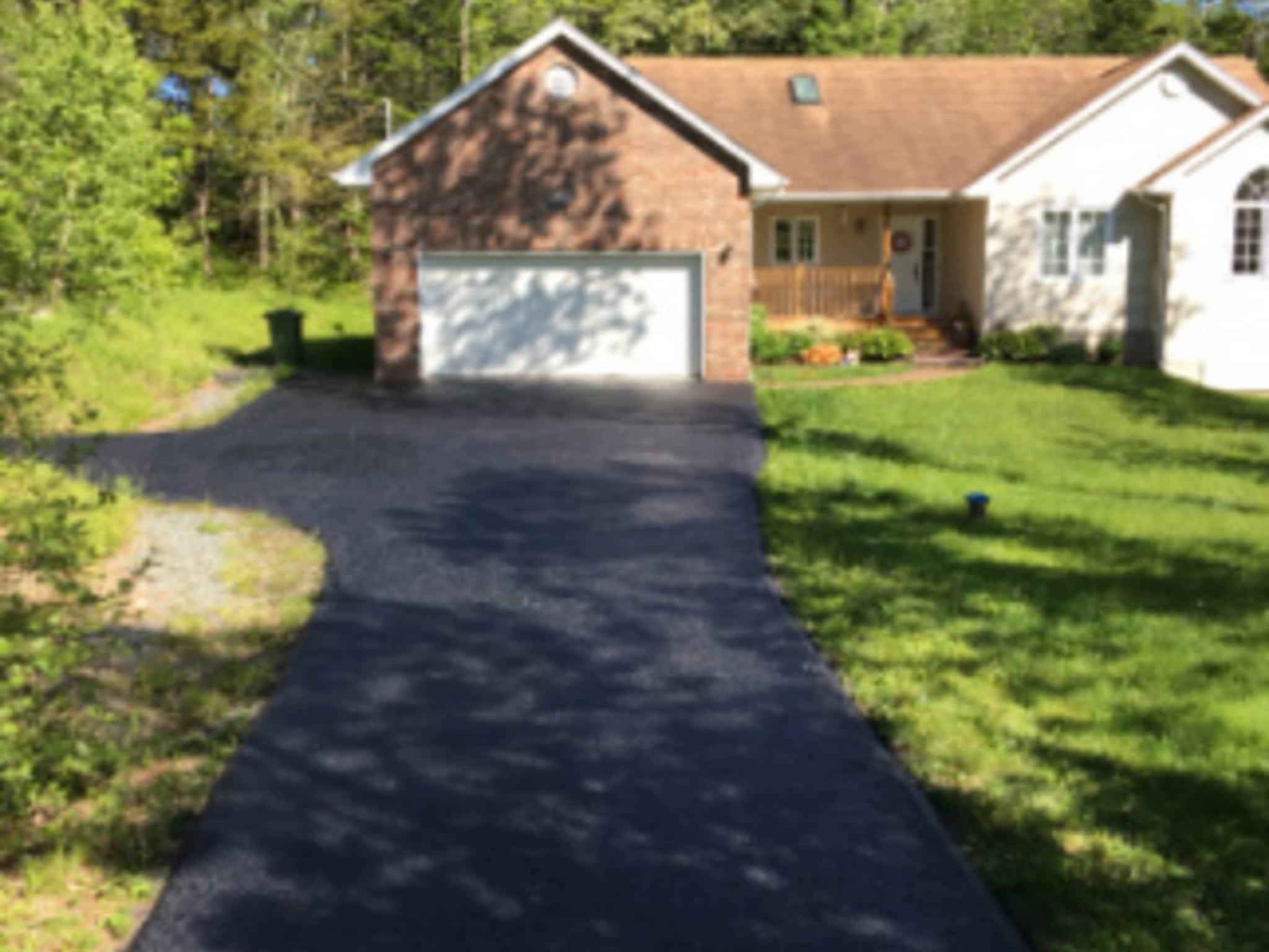 photo Curbside Appeal Driveway Sealing and Maintenance