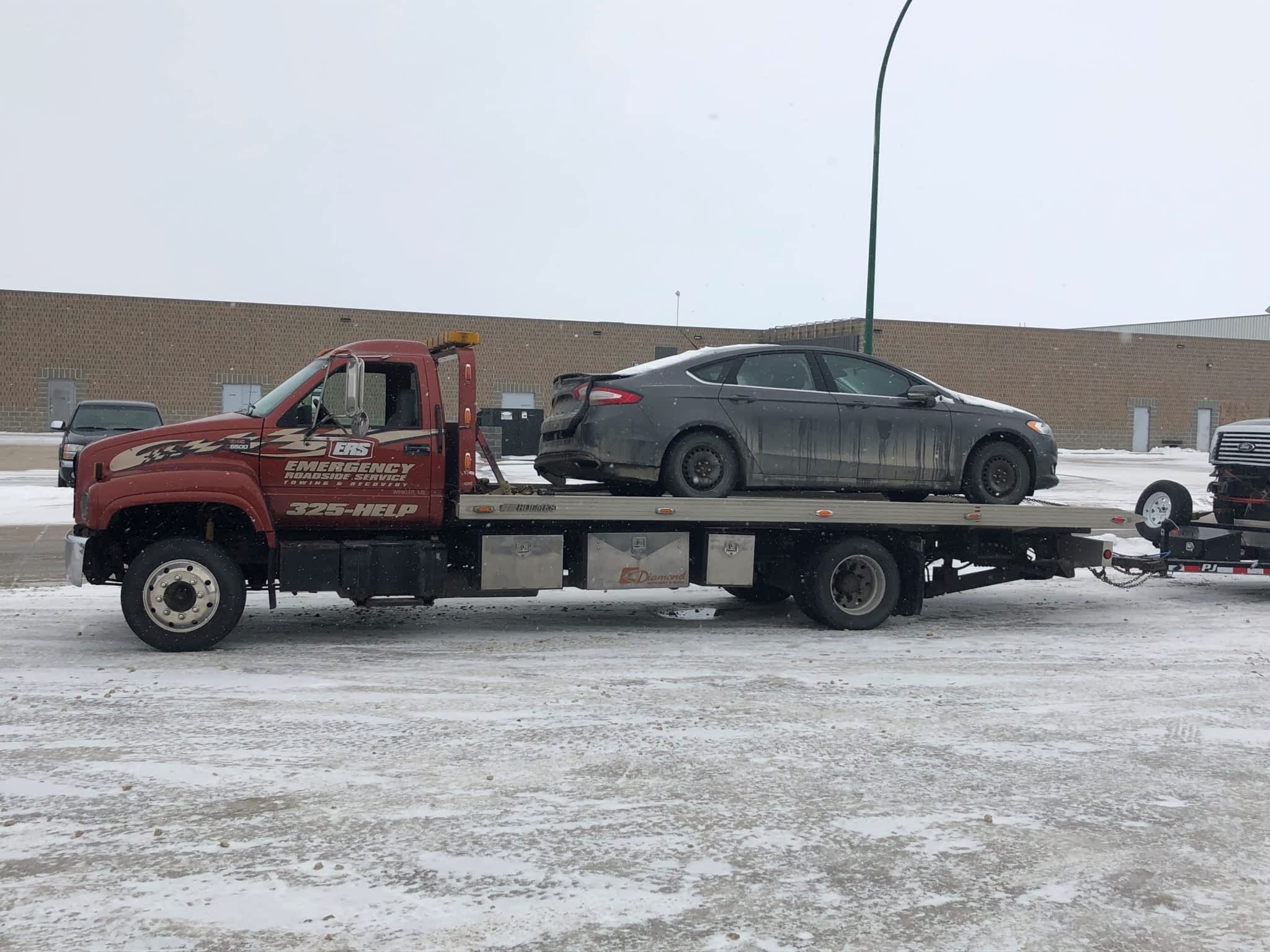 photo Emergency Roadside Service Towing & Recovery