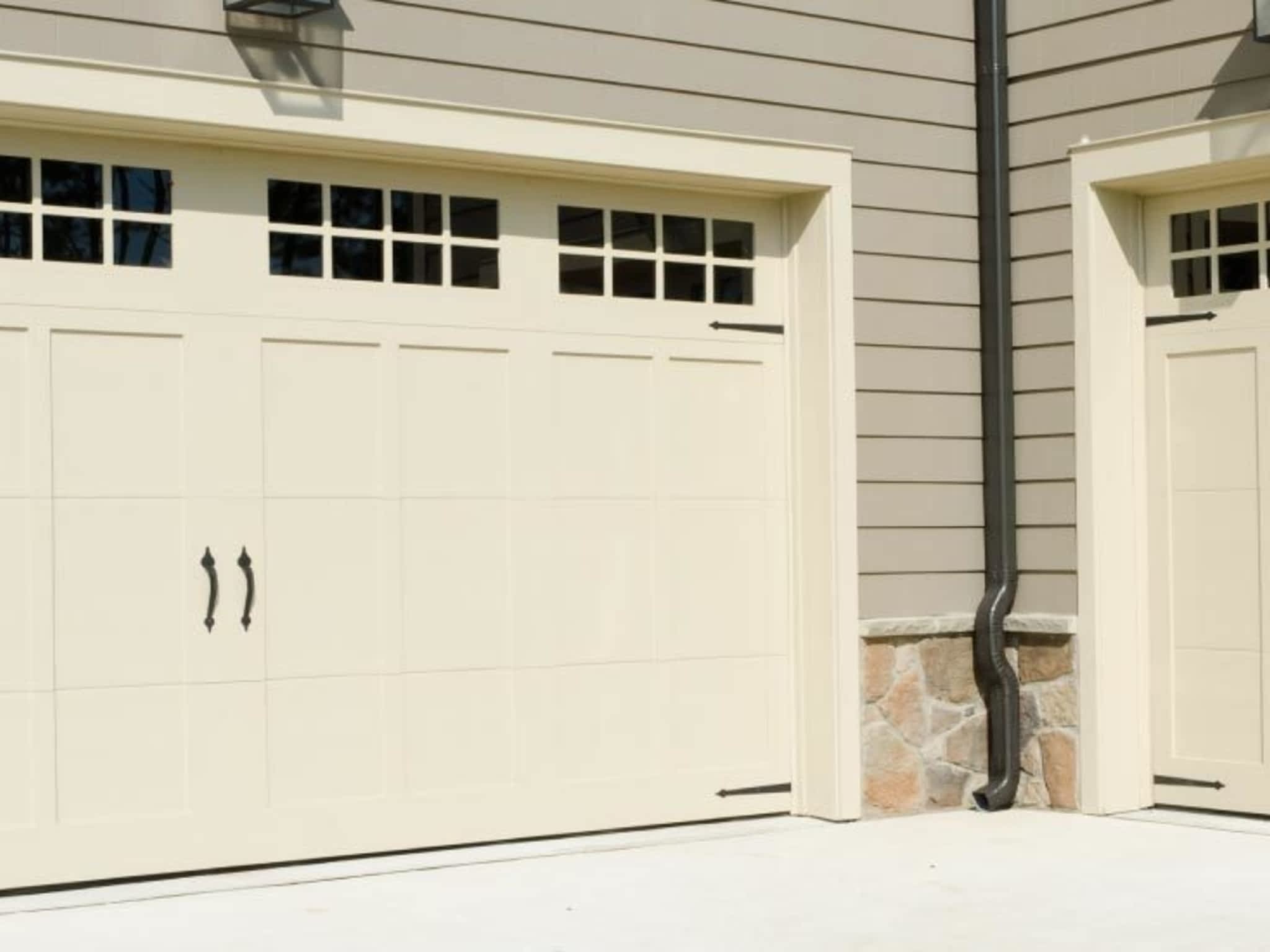 photo Portes L-G Rénovation portes de garage & portes automatiques