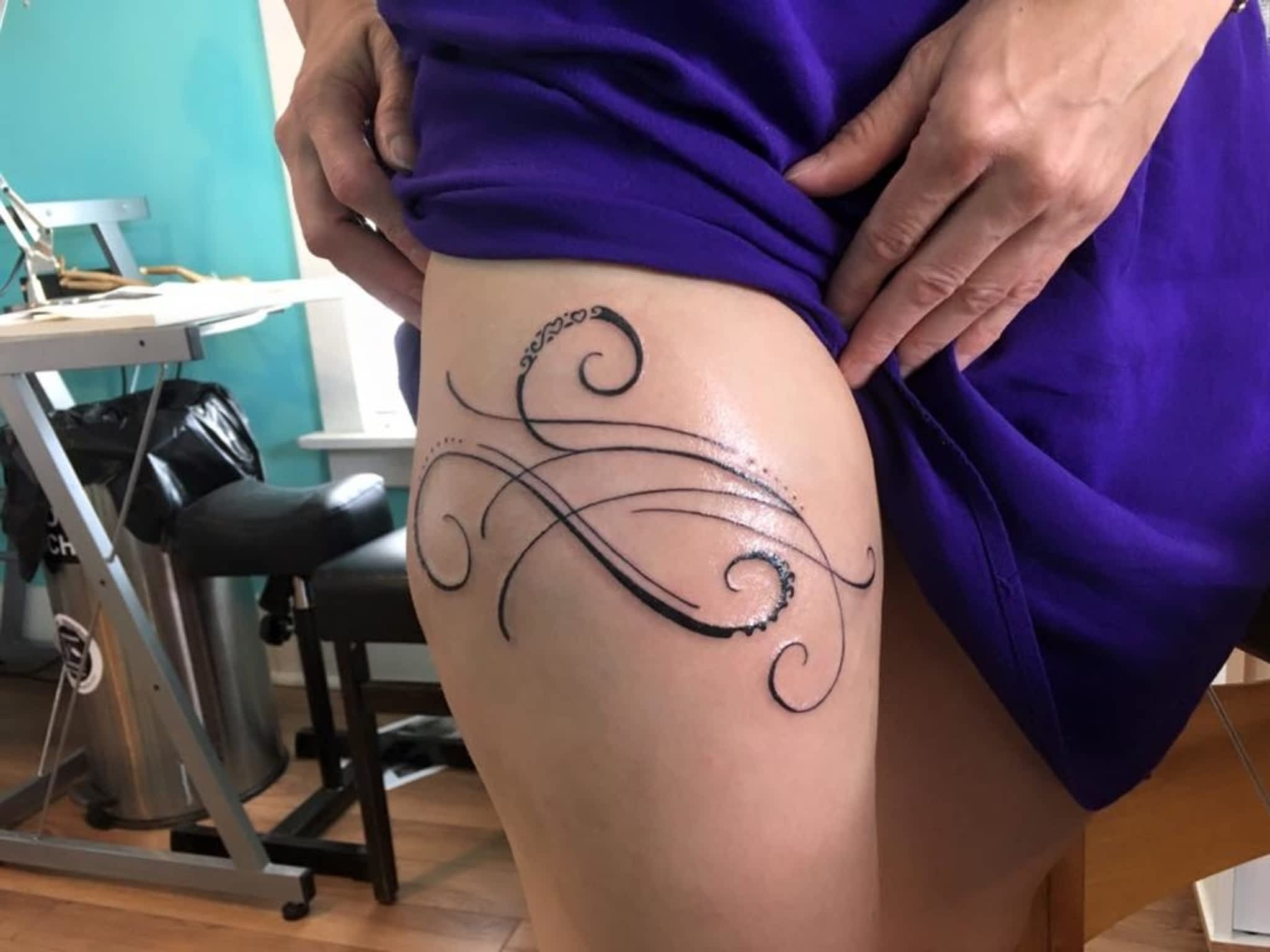 photo Infiniti Tattoos & Piercing Studios