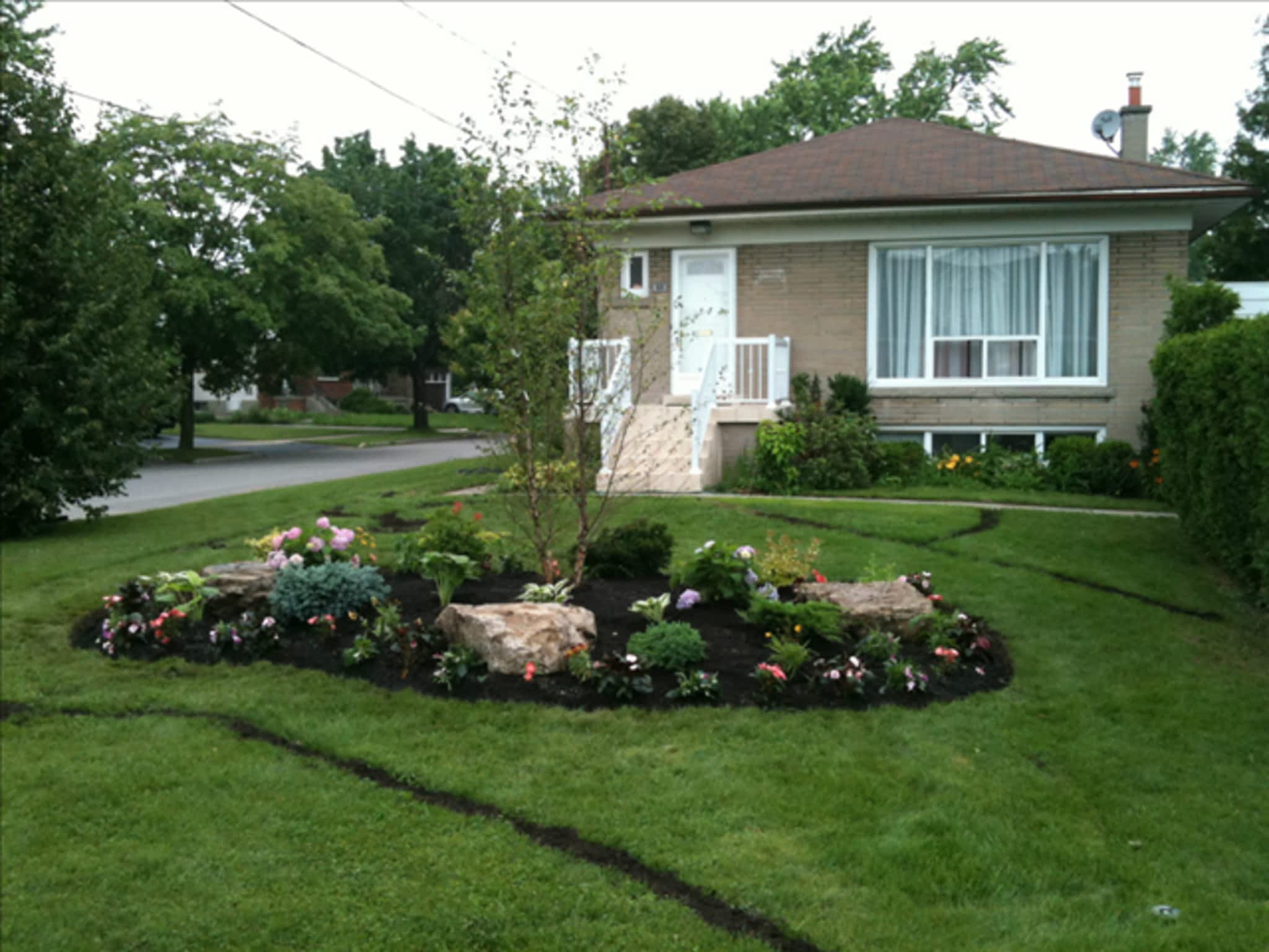 photo Green Earth Irrigation, Landscaping, Lighting & Snow Plowing