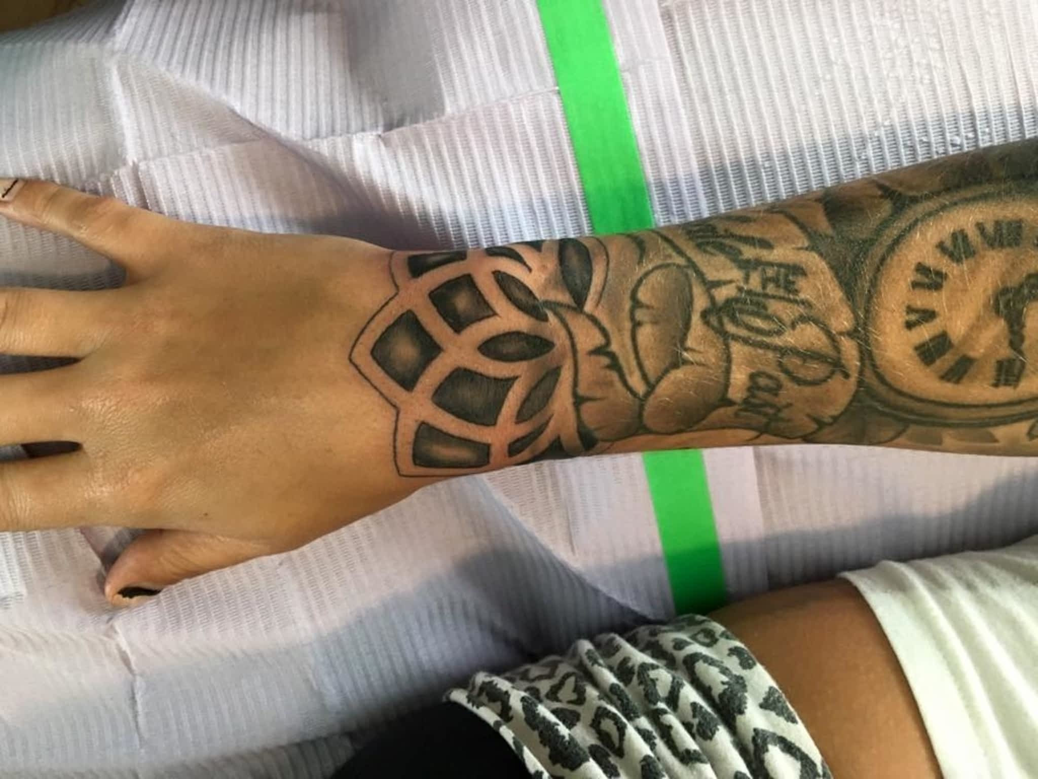 photo Infiniti Tattoos & Piercing Studios