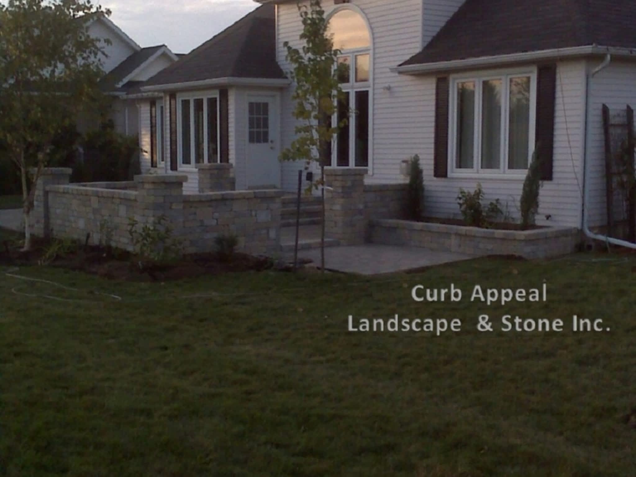photo Curb Appeal Landscape & Stone Inc.