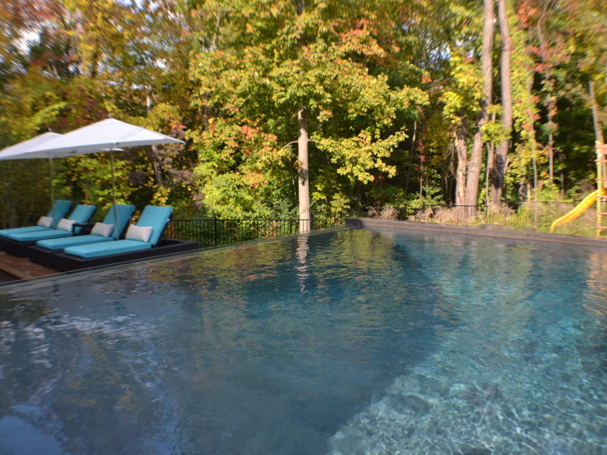 photo Vast Exteriors Inc - Luxury Pools & Landscaping