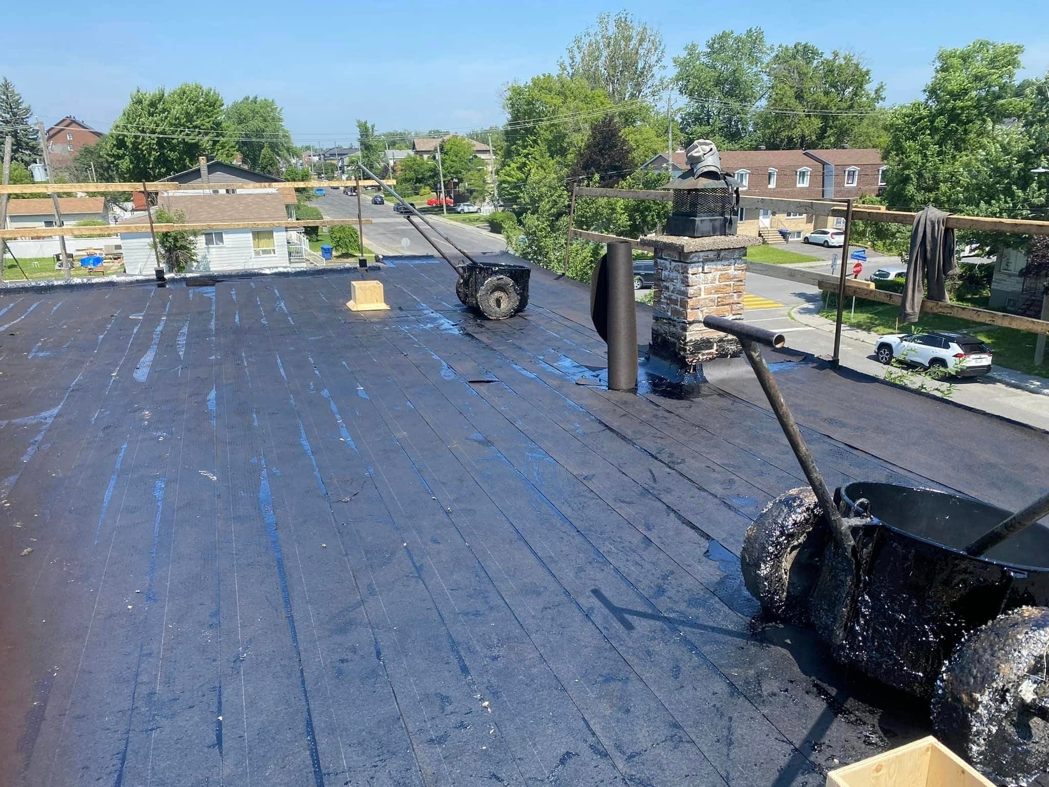 photo Toiture Brossard - Couvreur Bardeaux et toit plat