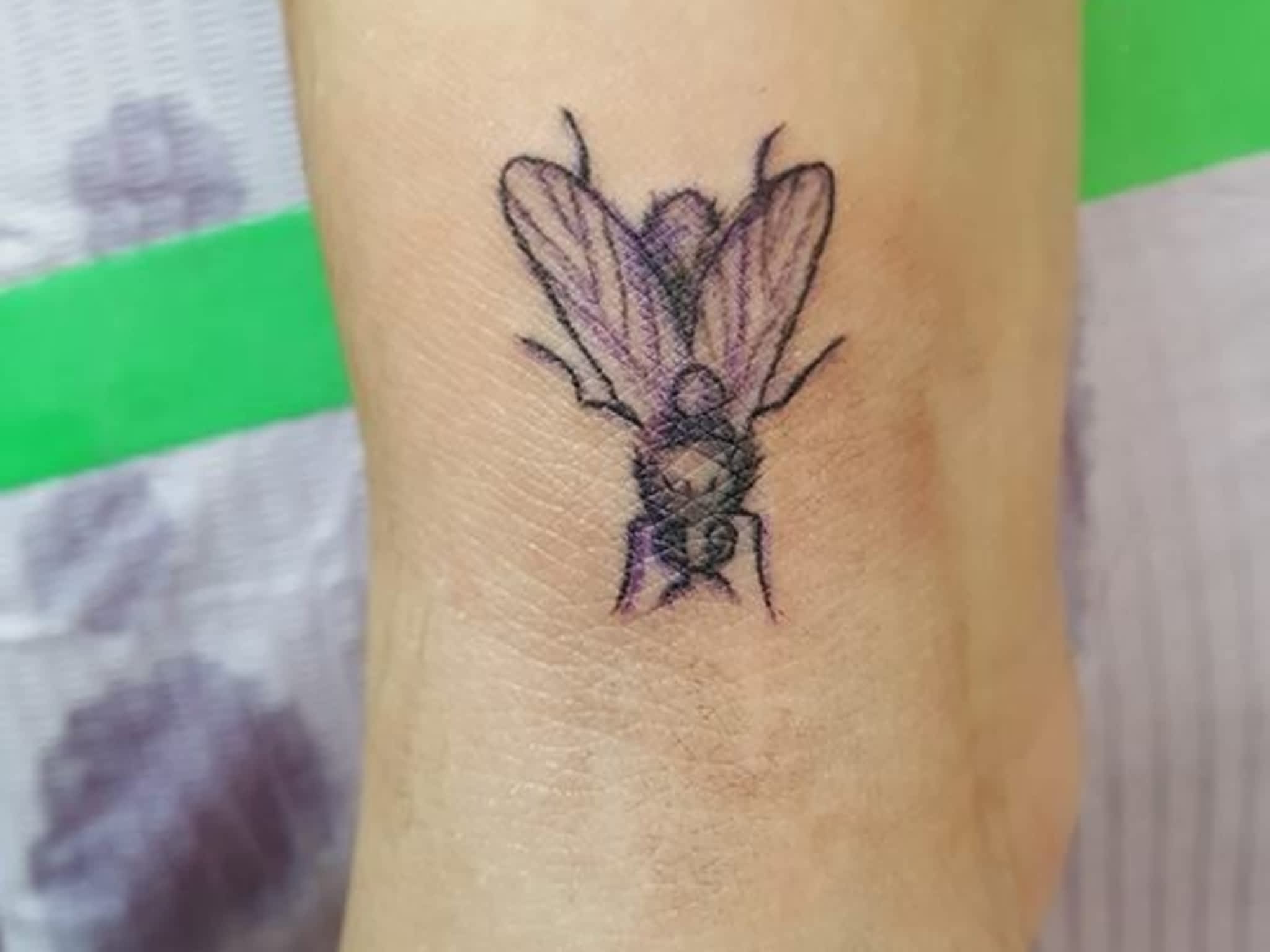photo Infiniti Tattoos & Piercing Studios