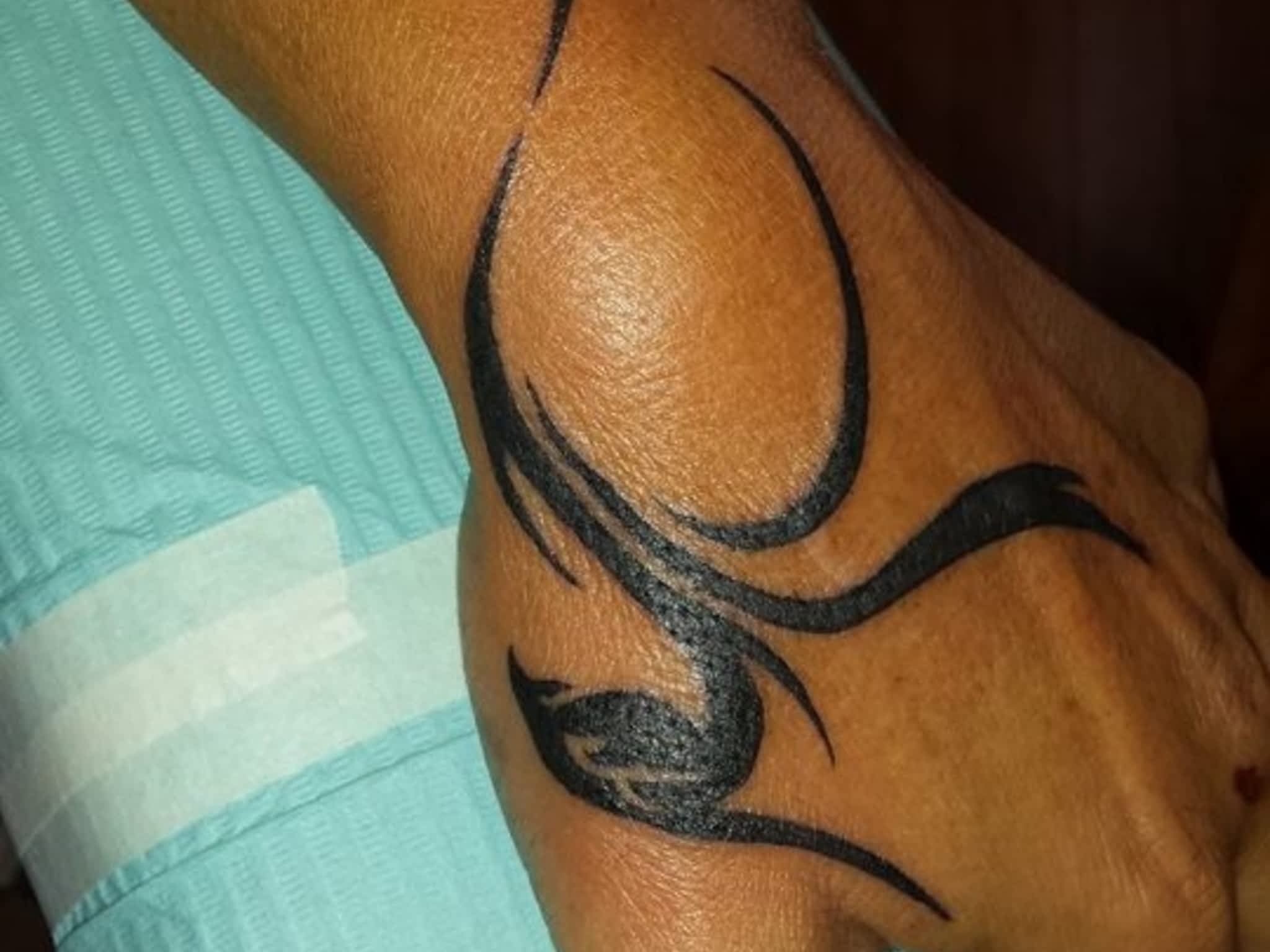 photo Infiniti Tattoos & Piercing Studios