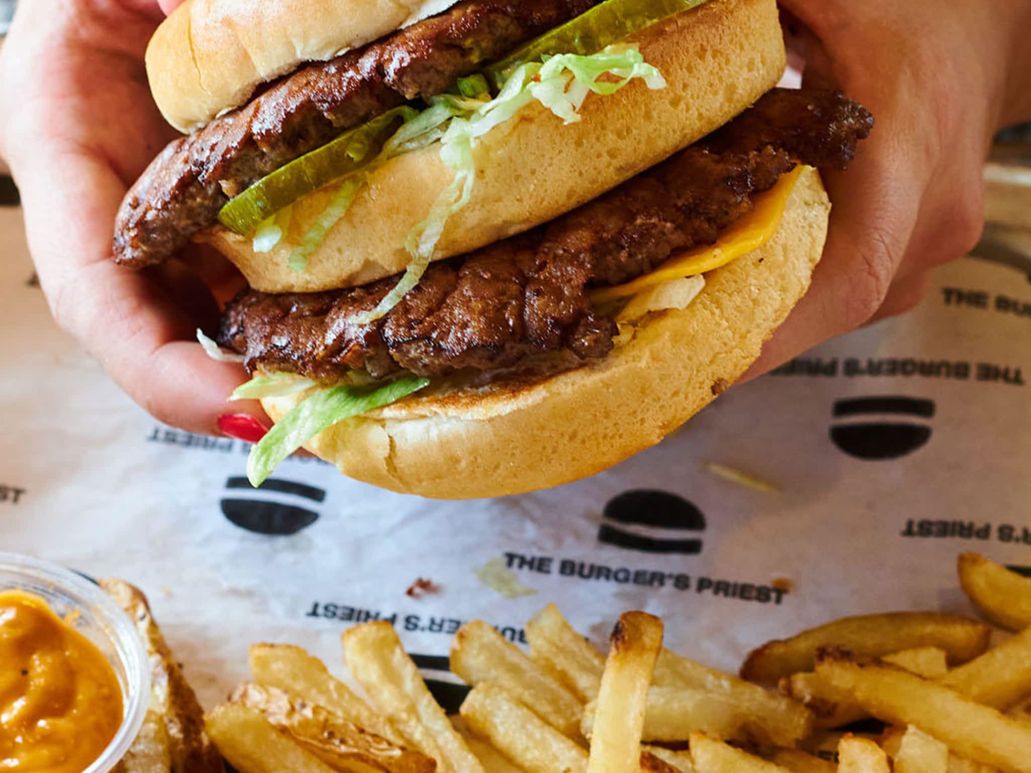 photo The Burger's Priest - PERMANENTLY CLOSED - RELOCATED TO 1922 QUEEN STREET EAST, TORONTO, ON M4L 1H5