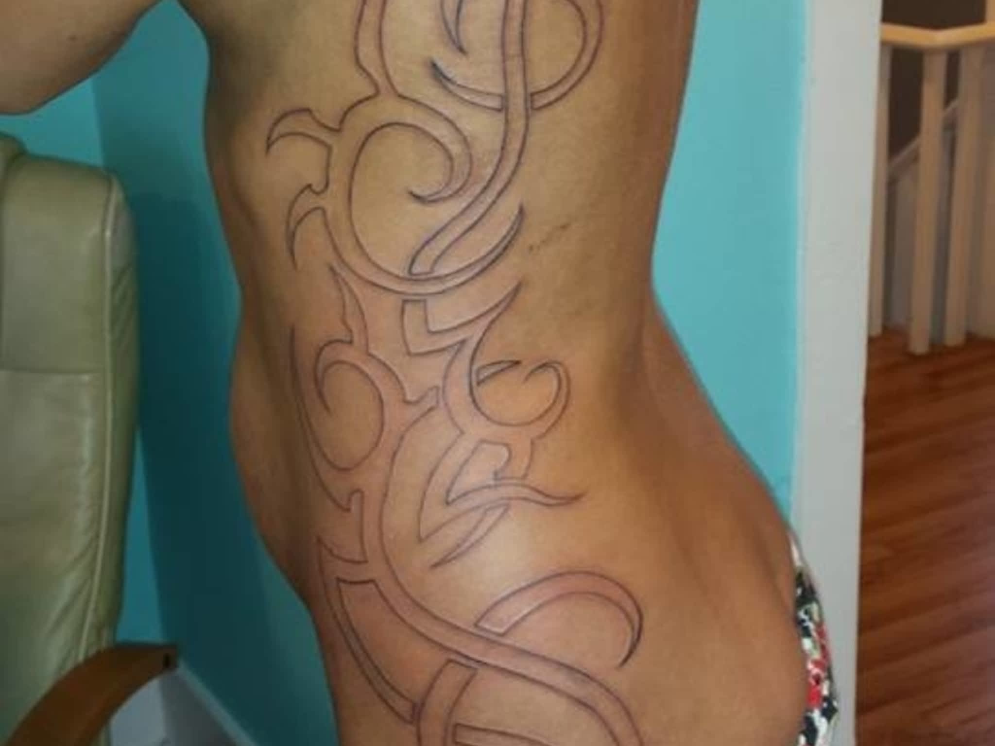 photo Infiniti Tattoos & Piercing Studios