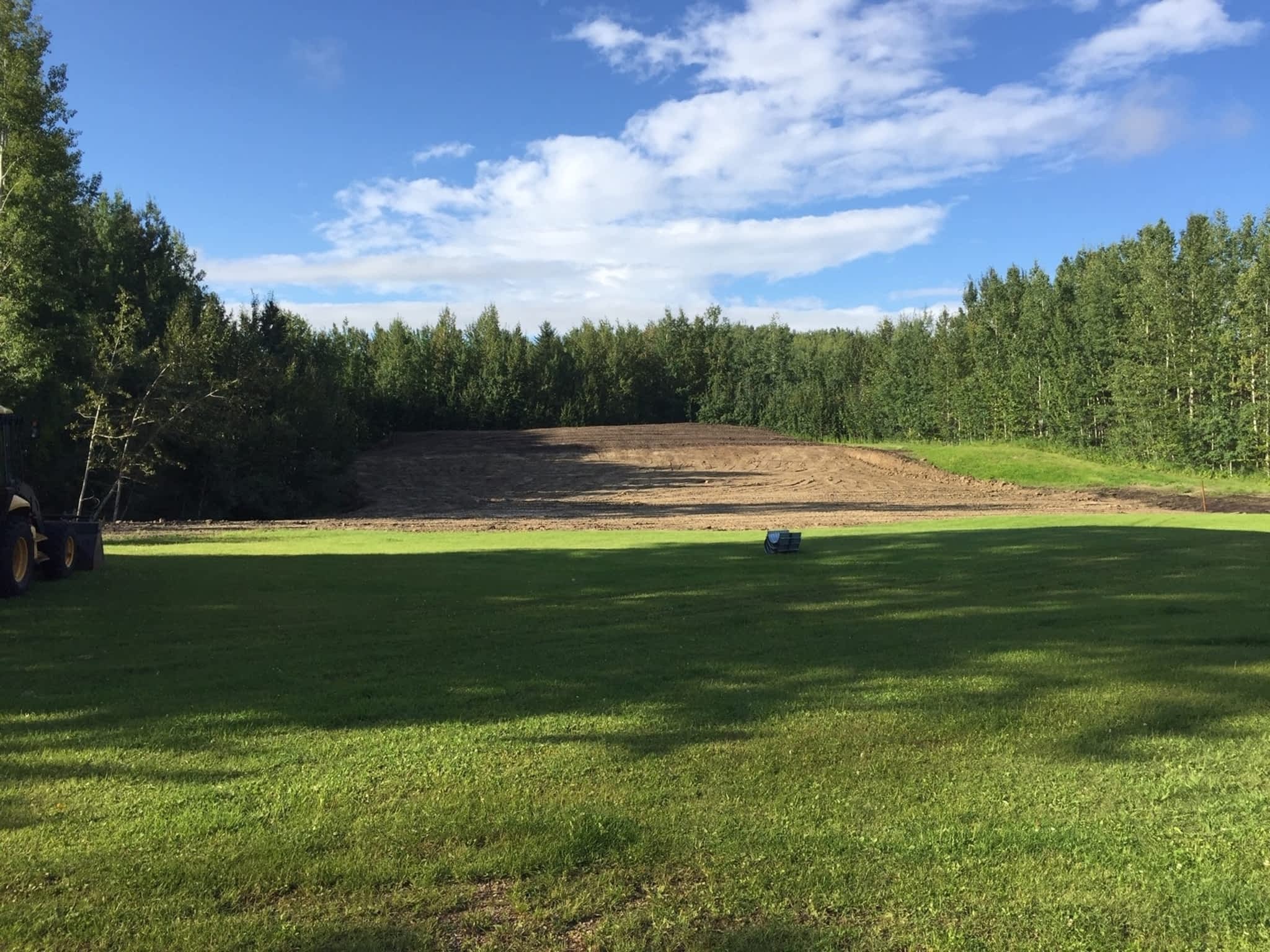 photo Concept Contracting Backhoe