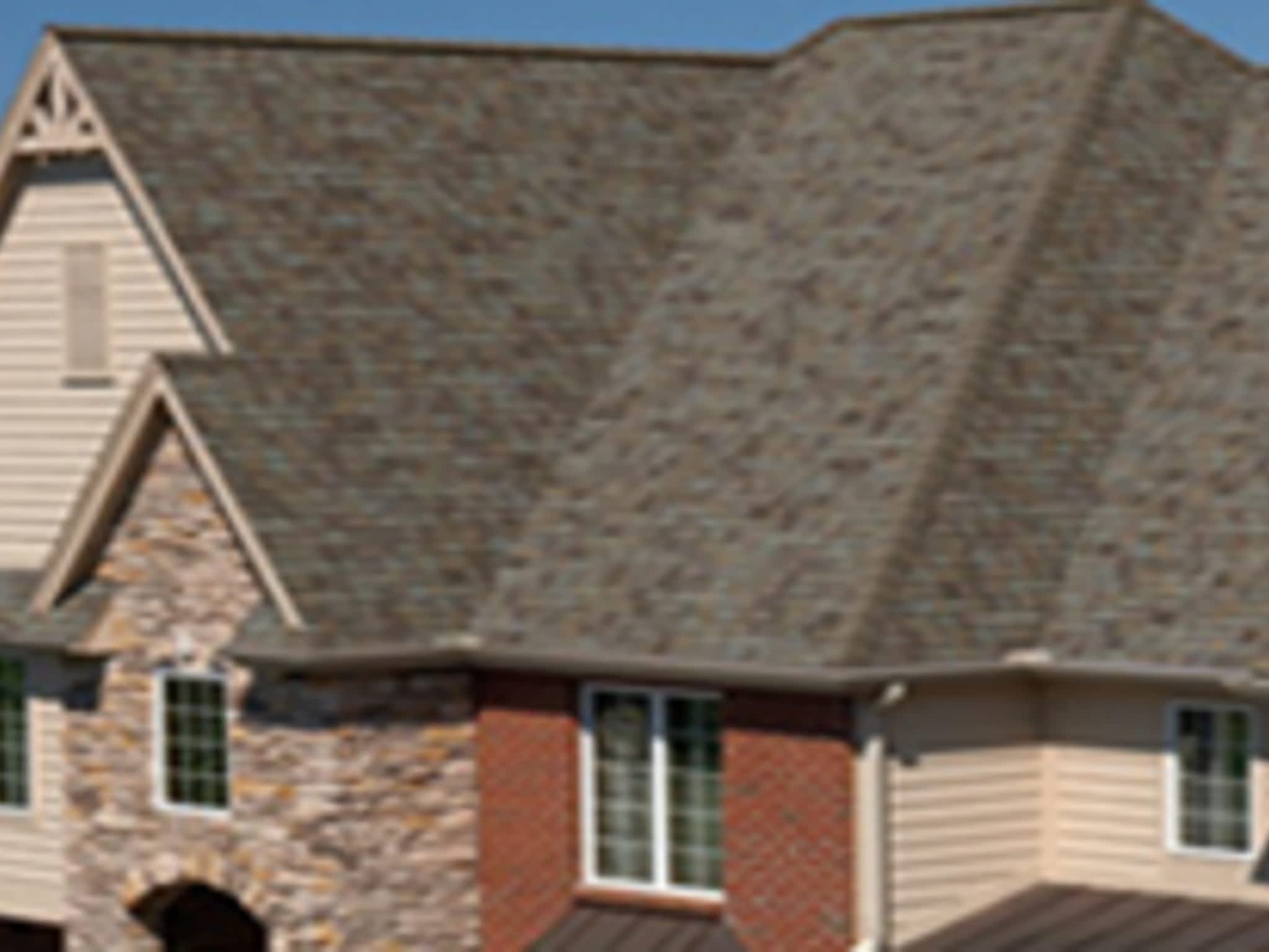 photo Rock Solid Roofing Inc