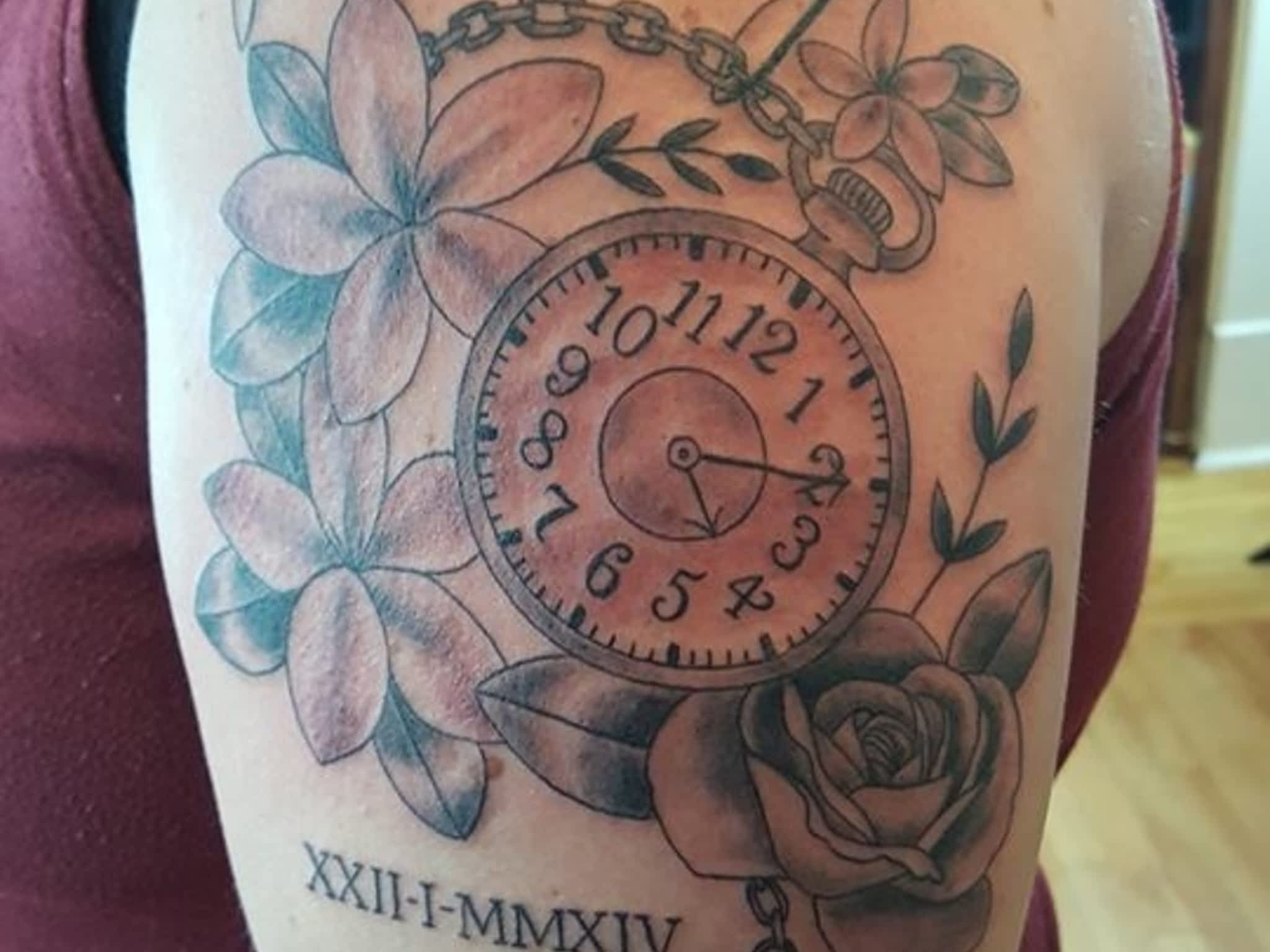 photo Infiniti Tattoos & Piercing Studios