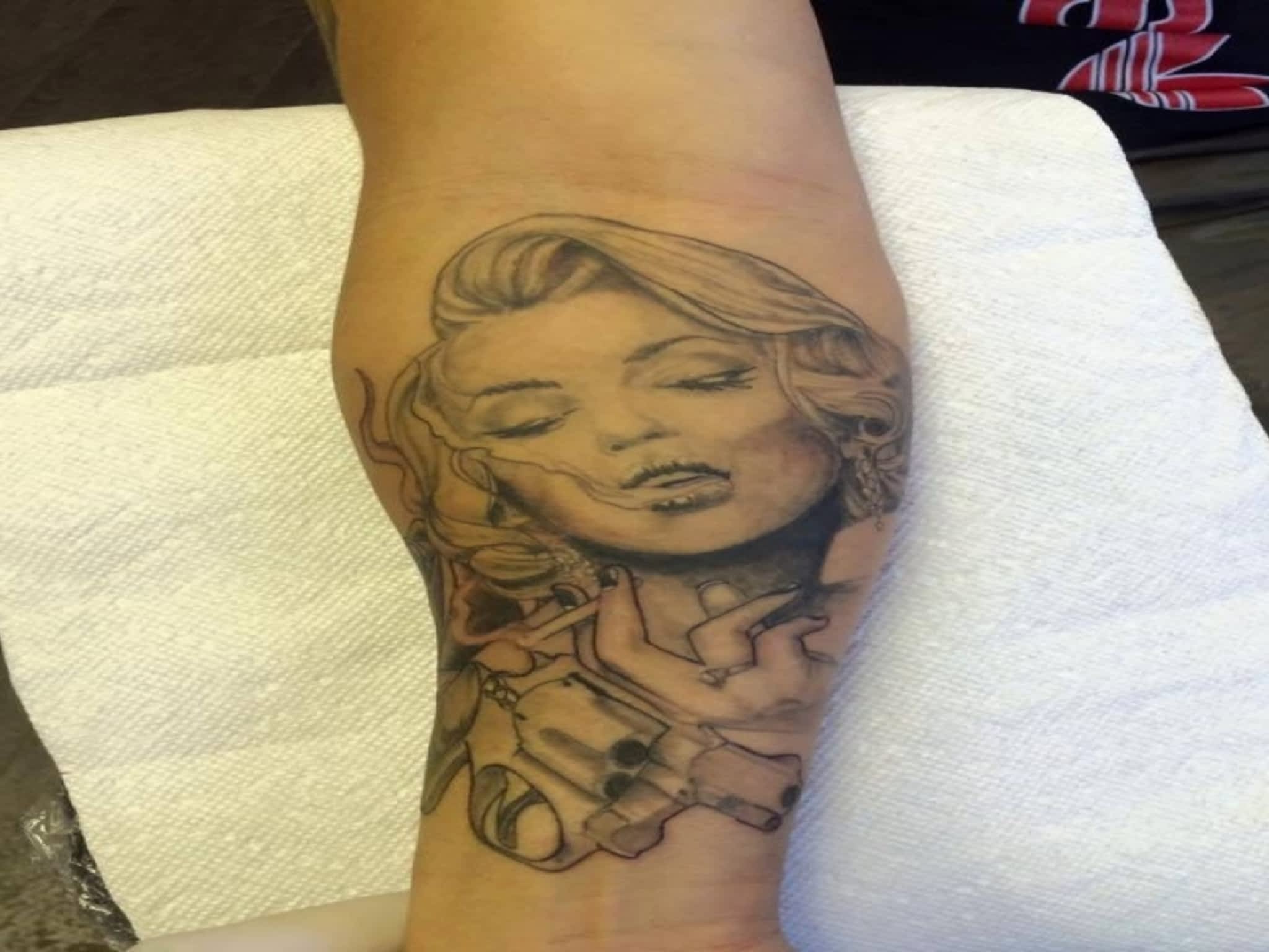 photo Divinelnk Tattoos & Piercing